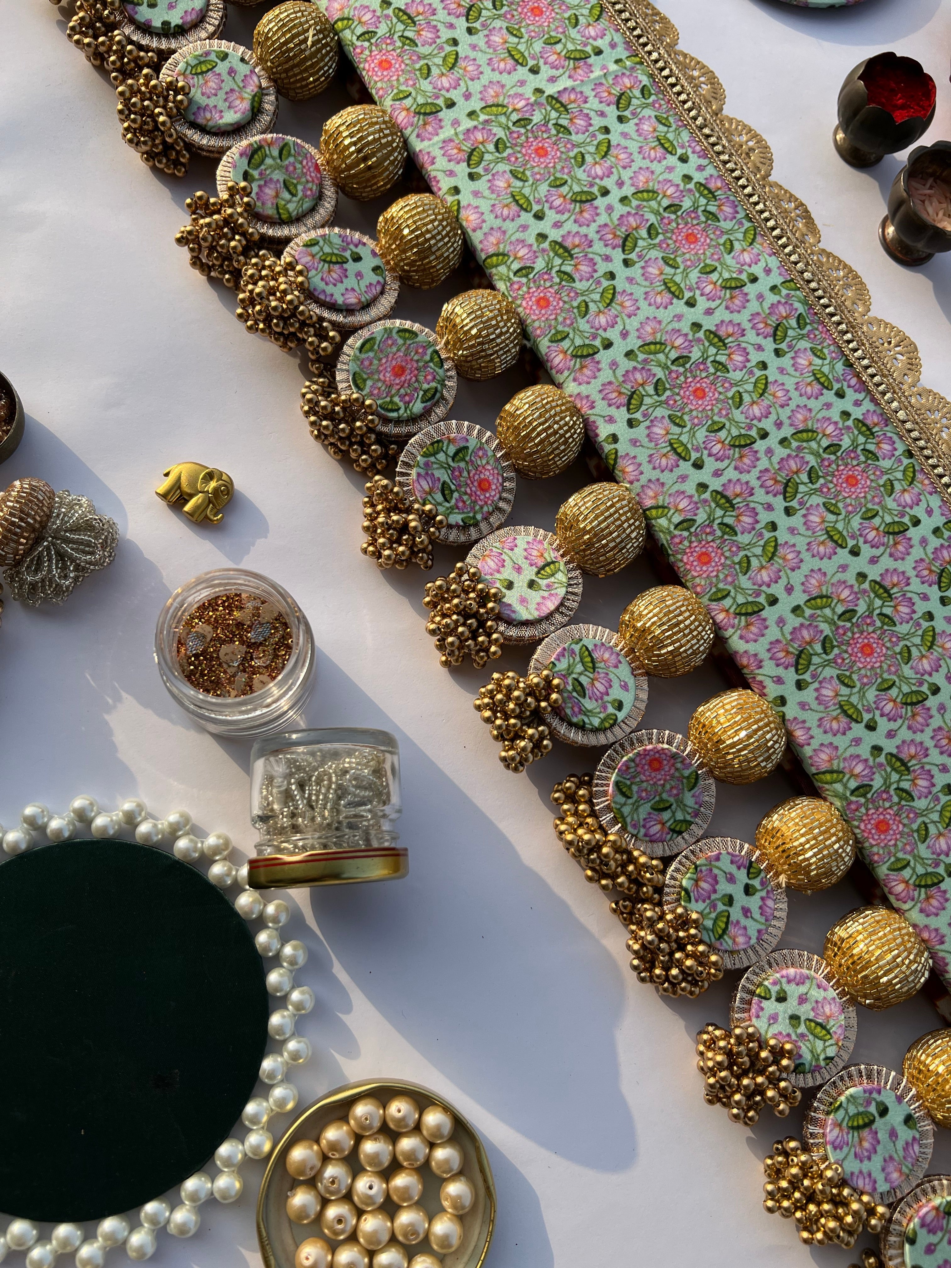Spherical Enchanted Lumba: Maroon Navratna Patola & Pastel Pistachio Inflorescence Divine Pichwai Two Way Toran
