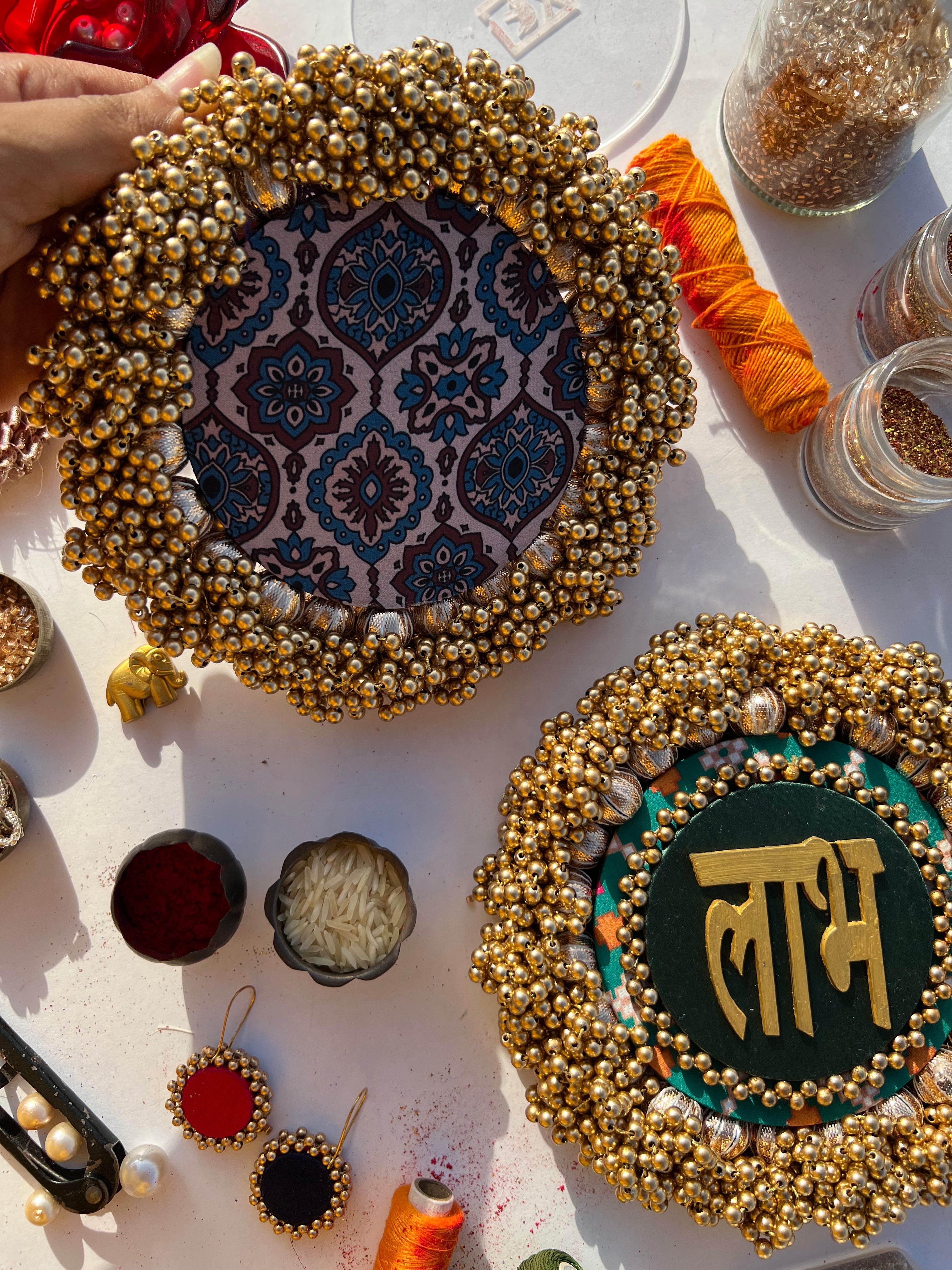 Bottle Green Navratna Patola & Upended Confluence Intense Ajrakh Beaded Shubh Labh Platters- Set of two