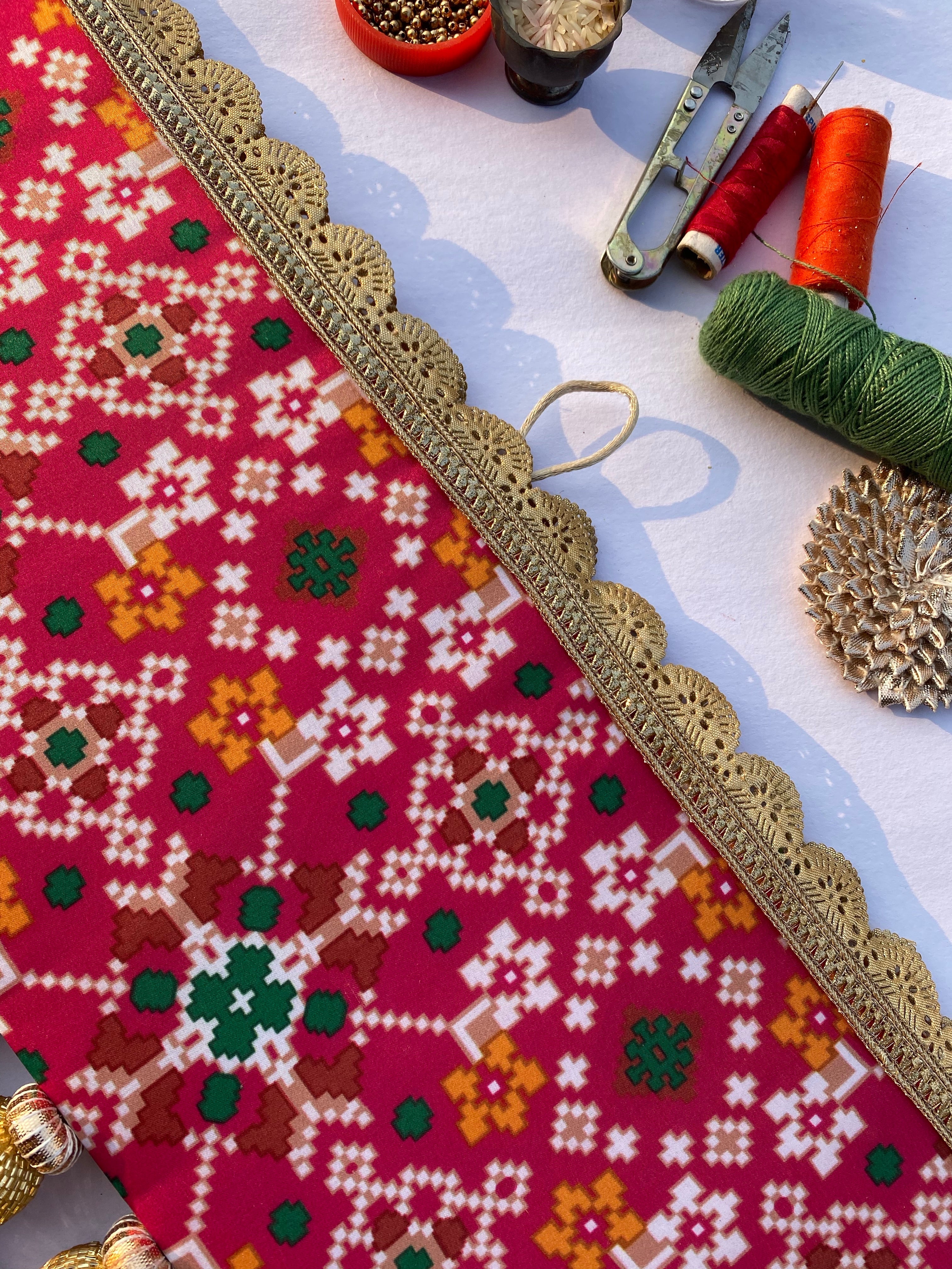 Chic-O-Fleek Sleek Toran : Maroon & Pink Navratna Patola X Glass Rhapsody Toran